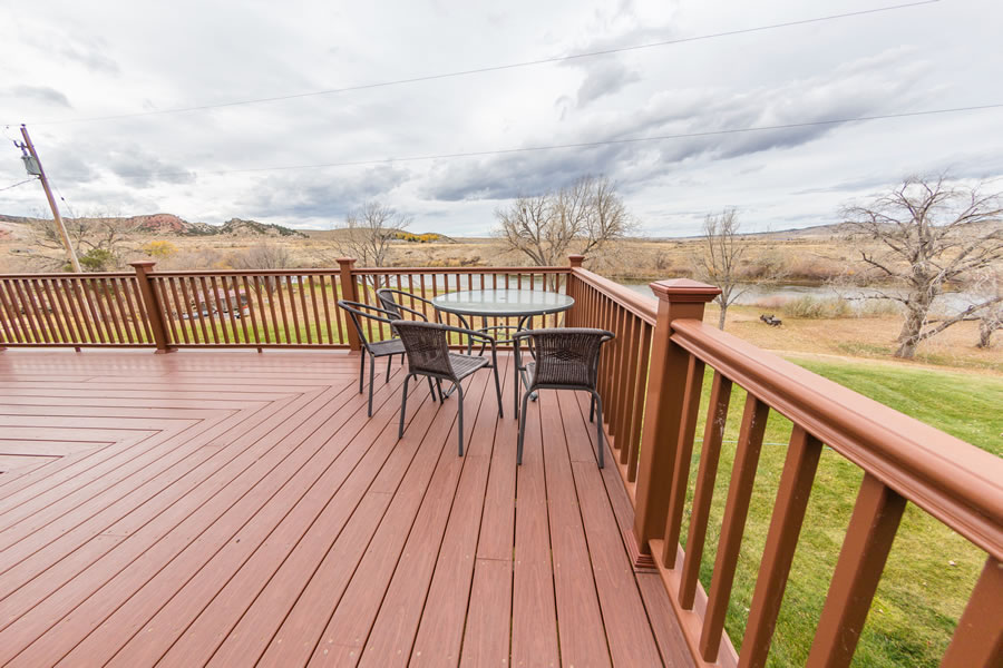 Deck dining with river views